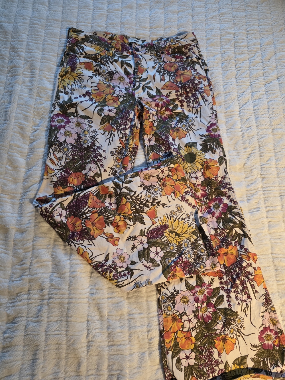 Free People X Wrangler Flare Pants With Yellow, Orange & Purple Floral Print